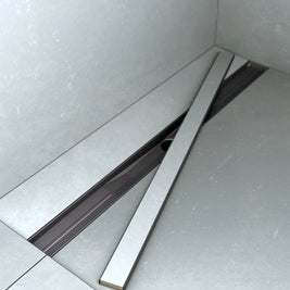 Befliesbare Mulde der ARTstream Duschrinne für nahtloses Fliesenfinish in barrierefreier Dusche