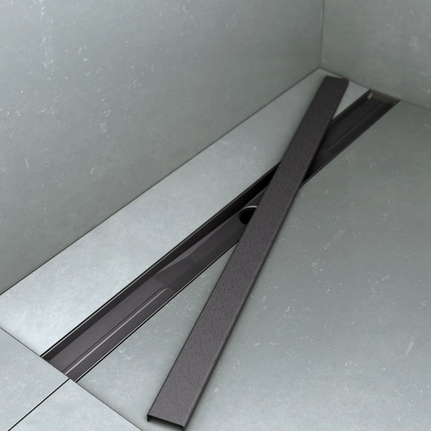 Gradlinige Edelstahl-Anthrazit-Optik der ARTstream Duschrinne als Alternative zum Fliesenfinish