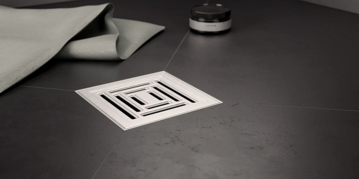 Flacher Bodenablauf mit Sichtrost Unica in modernem Duschboden