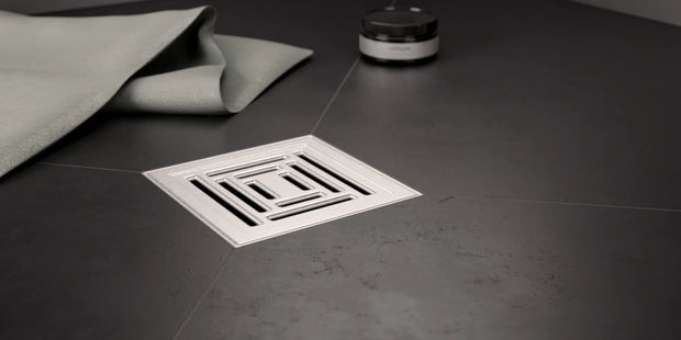 Flacher Bodenablauf mit Sichtrost Unica in modernem Duschboden